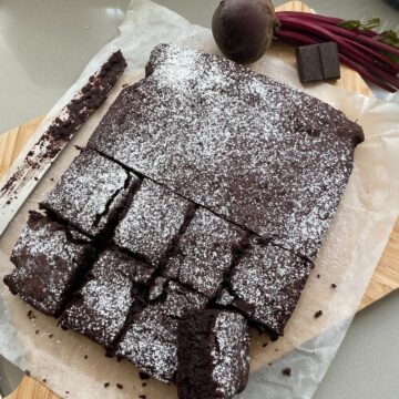 Beetroot and Chocolate brownies with slices cut out.