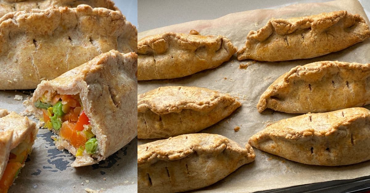 Baked Vegetable and Lentil Pasties on a baking tray.