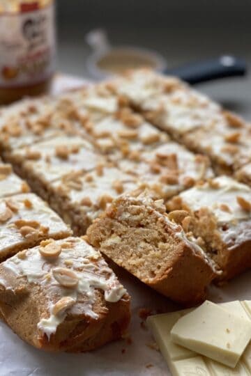 Peanut Butter and White chocolate blondies cut into portions.