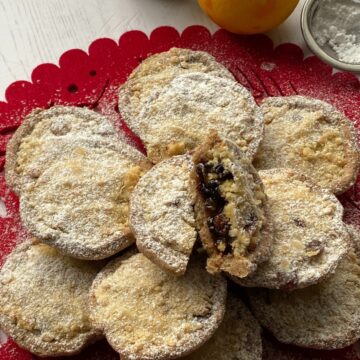 Small Streusel Mince Pies on a red place mat.