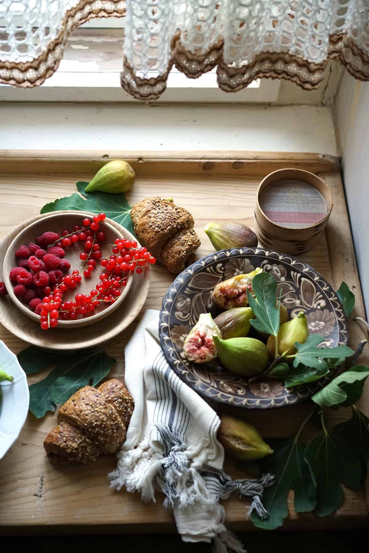 Bowls of berries and figs.