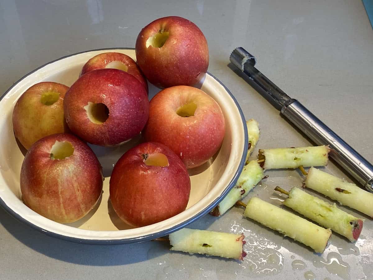 Dish of Red apples with the cores taken out.