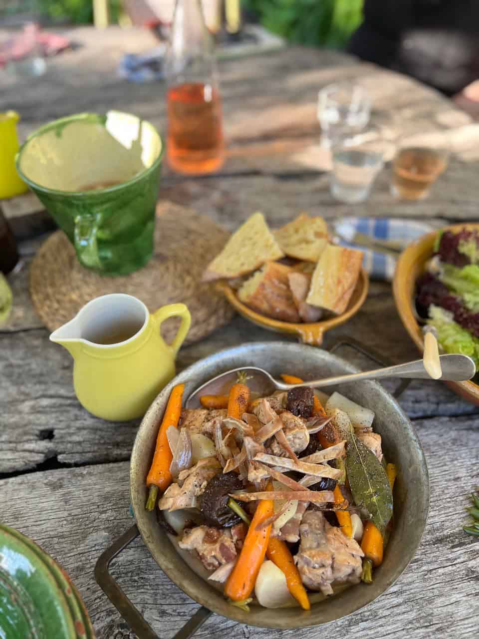 Bowls of food on a wooden table.