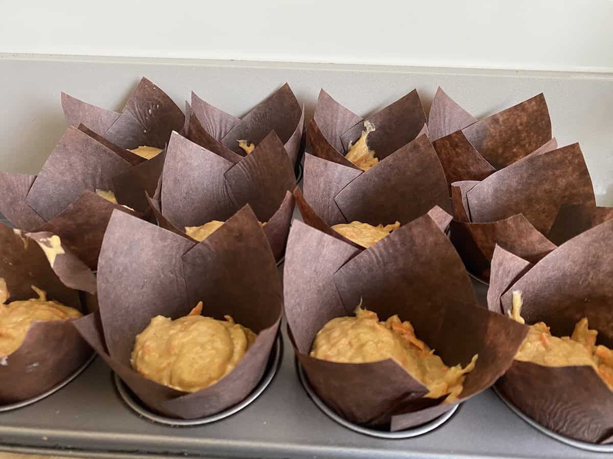 Tray of Carrot cake muffins ready to bake.