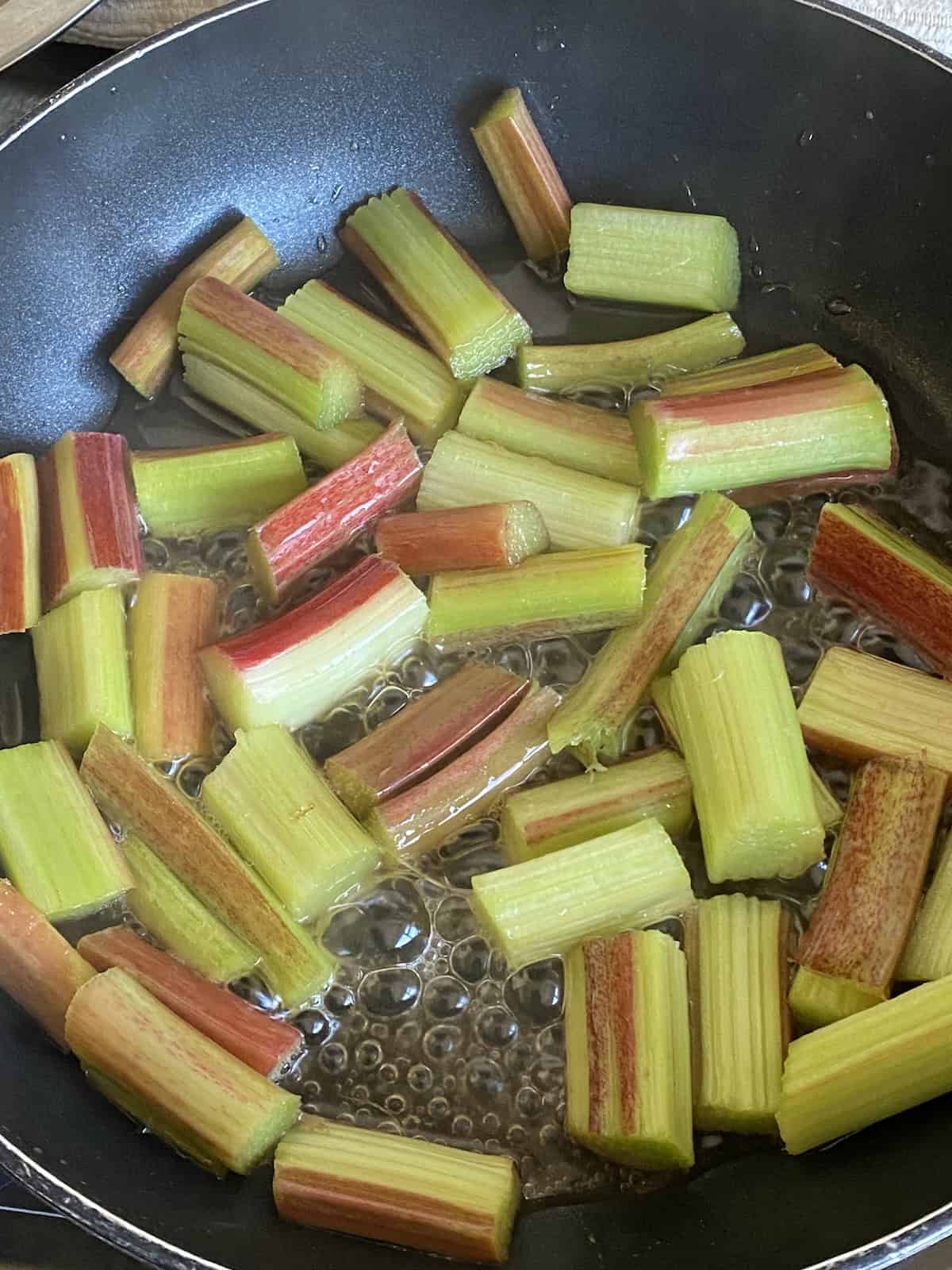 Rhubarb simmering in a pan.
