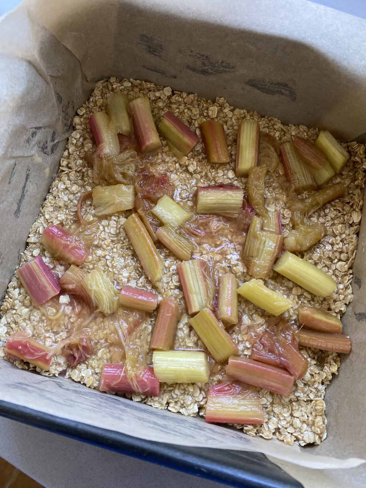 Rhubarb spread over a layer of Flapjack mixture.