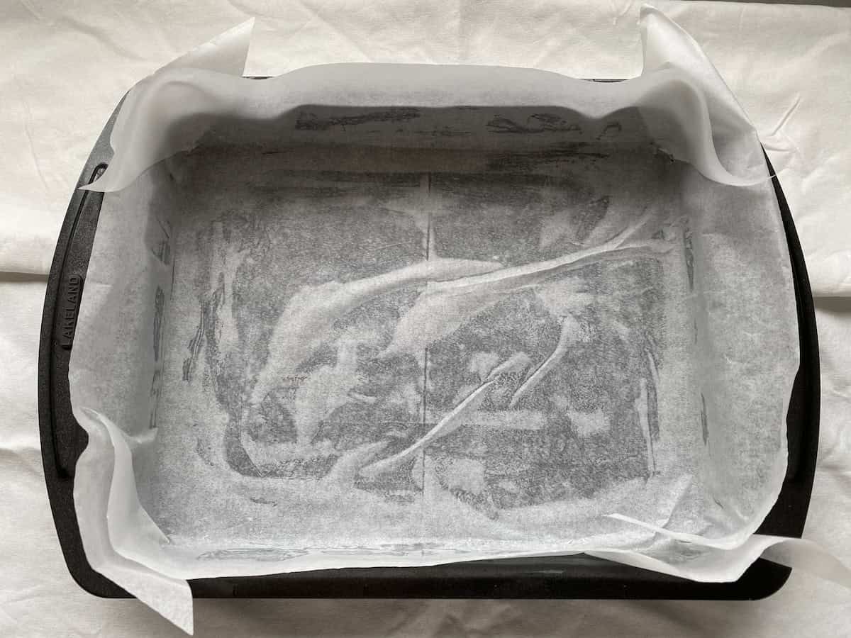 Traybake tin lined with parchment.
